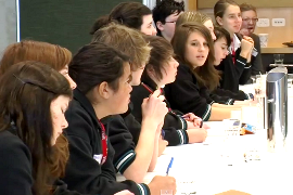 Students listen and engage as a Asia Literacy Ambassador speaks to them