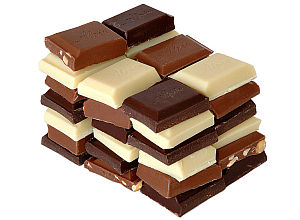 Different pieces of chocolate stacked up