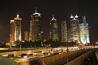 Buildings lit up at night in Pudong, Shanghai