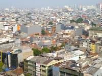 Suburban city landscape with heavily clouded skies