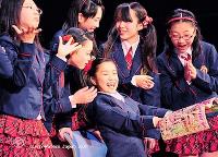 Modern youth enjoy a teenage fashion magazine