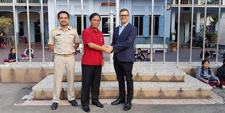 Andrew Kell meeting Director Kowit at a morning assembly