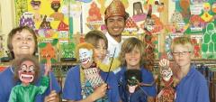 Kangaroo Island KICE students holding pupets with Indonesian teacher