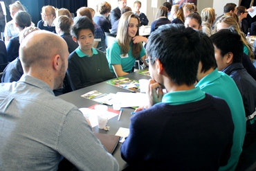 An Asia Literacy Ambassador talks with students